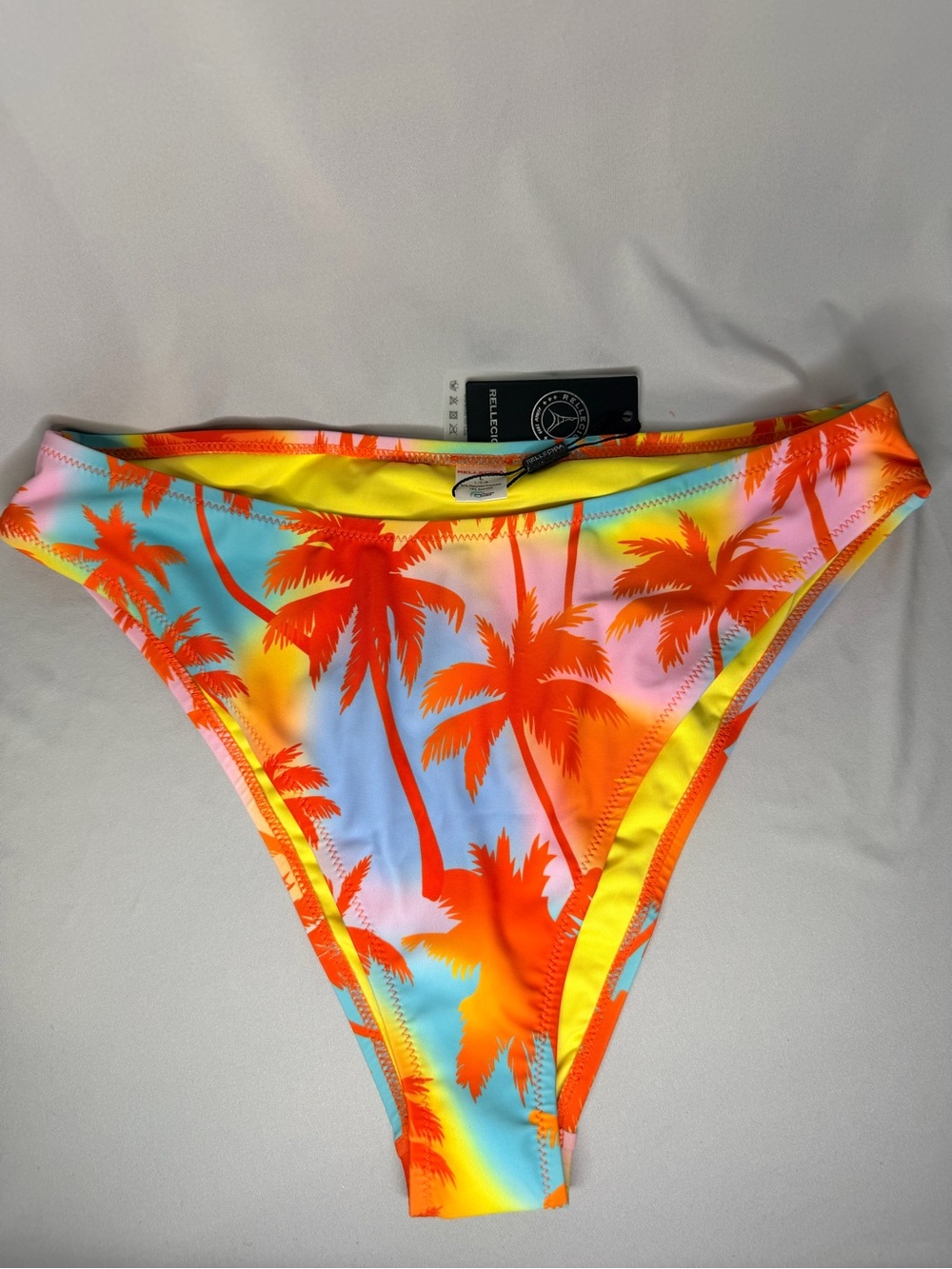 RELLECIGA Neon Palm-Print Bikini Bottoms in Orange and Yellow, size Large.